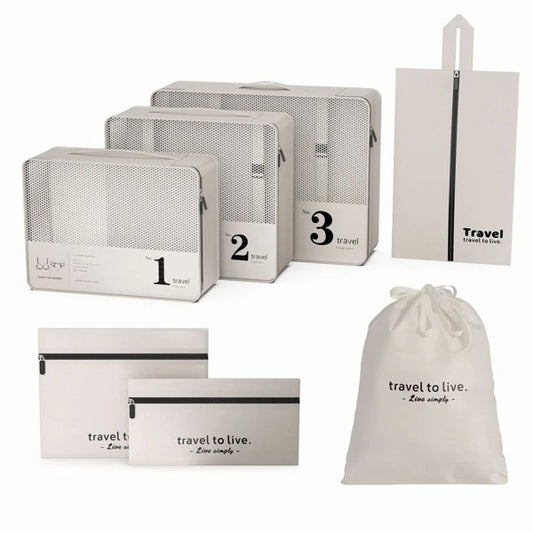 7-teiliges Reiseorganizer Set in Creme mit Packwürfeln und Taschen